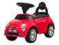 Voiture porteur rouge avec volant et siège noirs, avec des roues chromées.
