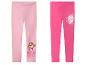Twee kinderleggings: één lichtroze met Skye van Paw Patrol en één donkerroze met een Barbie-logo.
