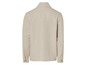 Een beige overhemd met lange mouwen.