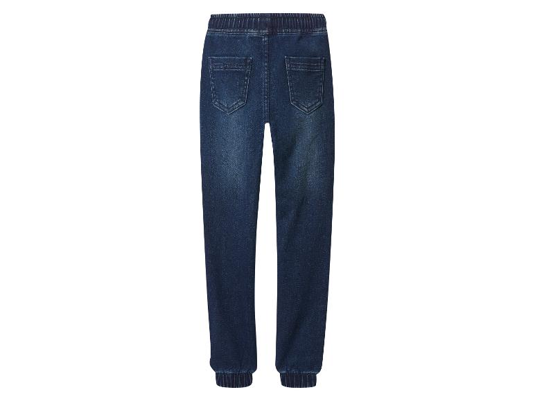 Jean bleu foncé pour enfant avec taille et chevilles élastiquées.