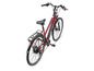 Een rode elektrische fiets met een bagagedrager.