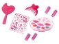 Kit de maquillage jouet rose avec baguette en forme de cœur, peigne, bigoudis, autocollants et palette de gloss.