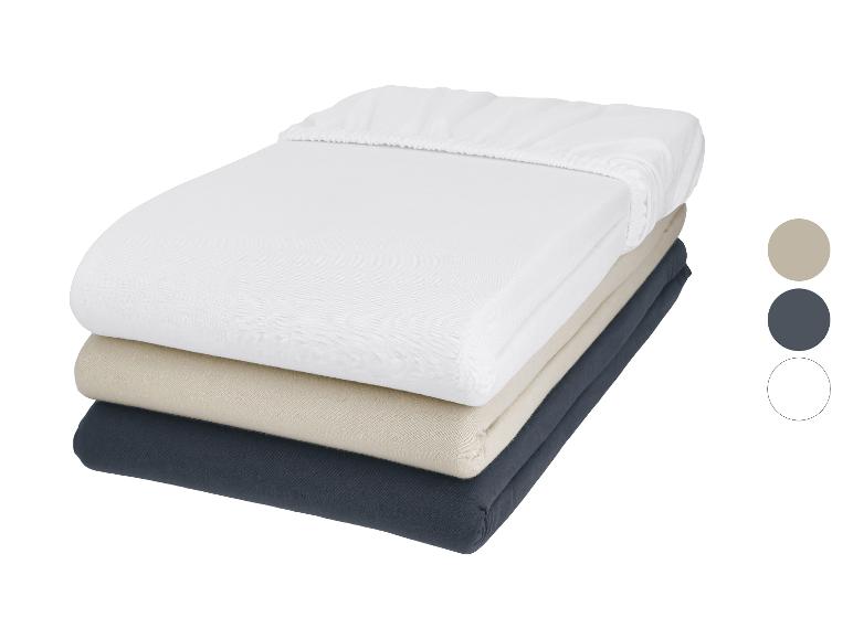 Katoenen hoeslaken set in wit, beige en donkergrijs.