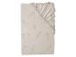 Drap-housse beige avec motifs floraux
