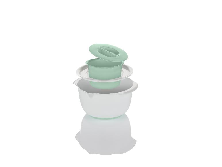 Een witte mengkom met een groene deksel en een kleine kom