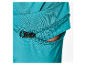 Fermeture éclair sur un pantalon turquoise.