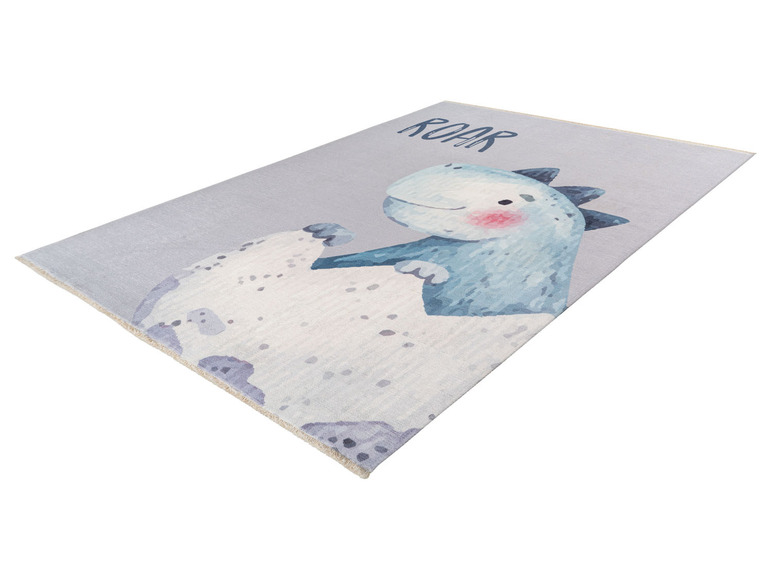 Een grijs tapijt met een blauwe dinosaurus en de tekst 'ROAR'