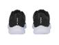 Paar Crivit sneakers, zwart met witte zool.