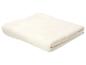 Gevouwen witte handdoek met wafelpatroon detail