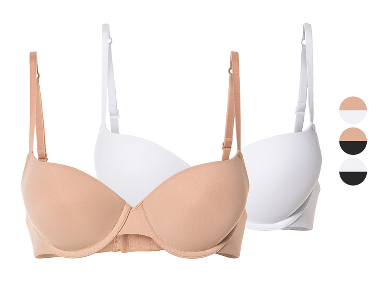 Deux soutiens-gorge, un beige et un blanc.