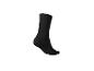 Une chaussette noire sur fond blanc.