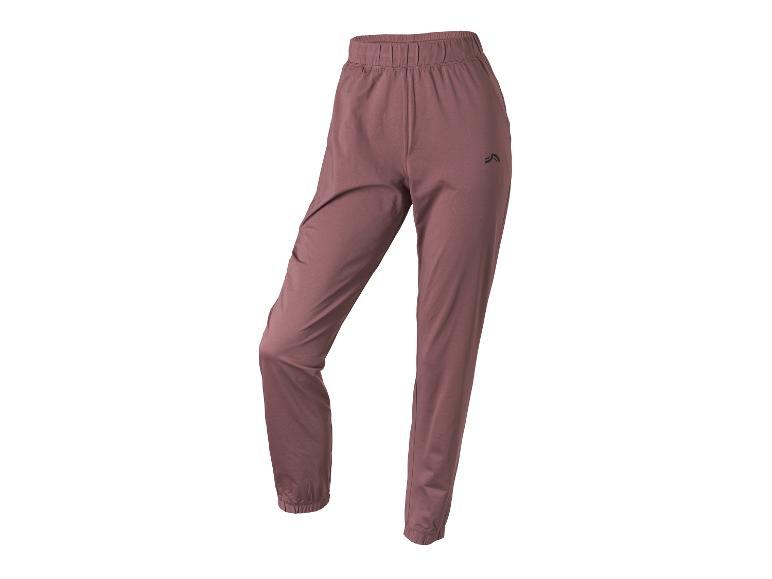 Pantalon de sport rose-brun avec taille et poignets élastiques.