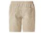 Beige joggingbroek met elastische tailleband en achterzak.