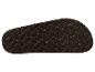 Semelle de sandale marron avec motif de grille ondulée.