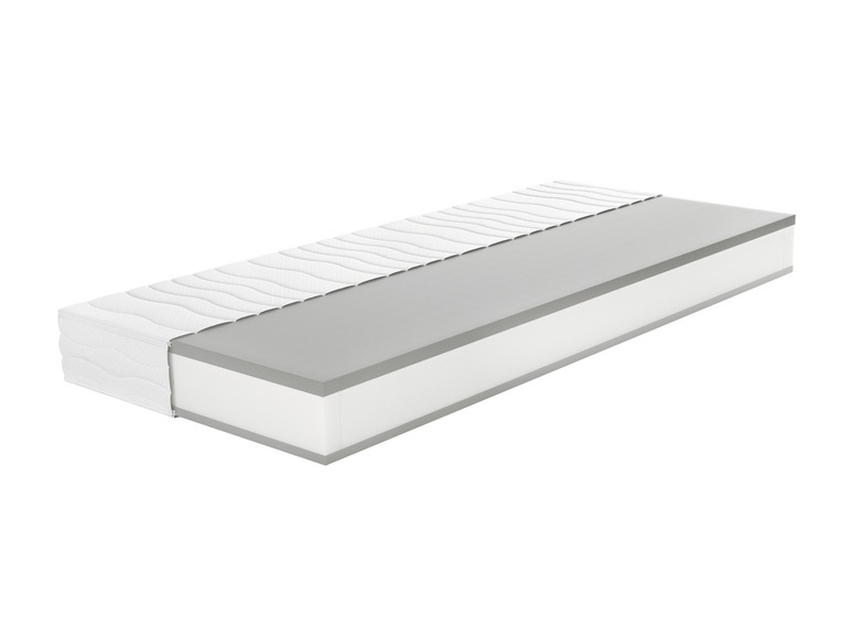 Een wit matras met een grijze basis.