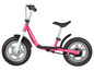 Een roze loopfiets met zilveren wielen