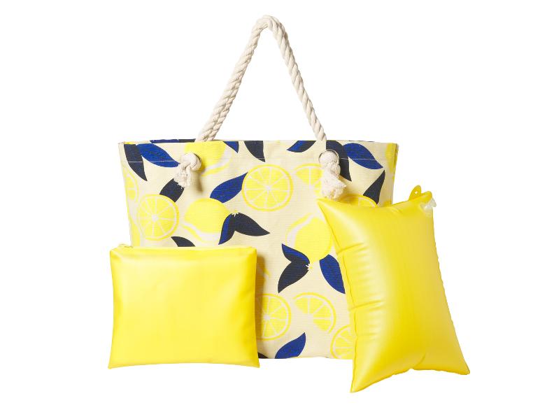 Strandtas met citroenprint, geel toilettas en opblaasbaar kussen.