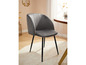 Chaise de salle à manger en velours gris avec pieds noirs.