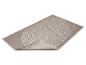 Beige vloerkleed met een wit geometrisch lijnpatroon