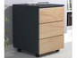 Une armoire gris foncé avec trois tiroirs sur roulettes, finie en bois clair.
