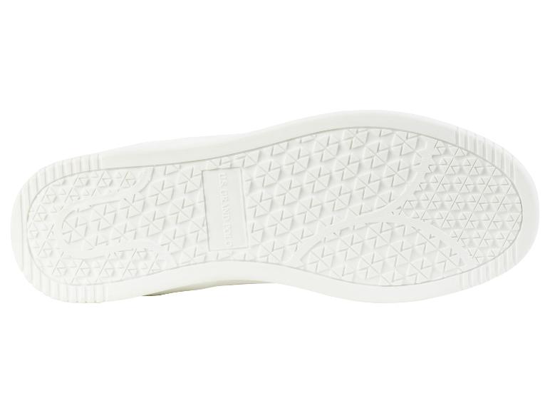 Witte zool van een U.S. Polo Assn. sneaker.
