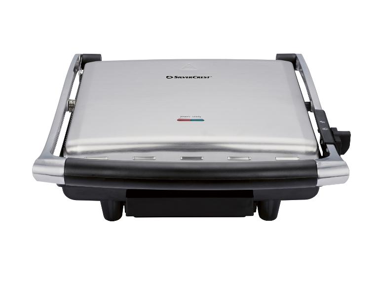 Een SilverCrest roestvrijstalen elektrische grill met stroom- en gereed-indicatoren.