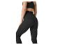 Ensemble de sport femme avec top et leggings noirs côtelés, vue arrière.