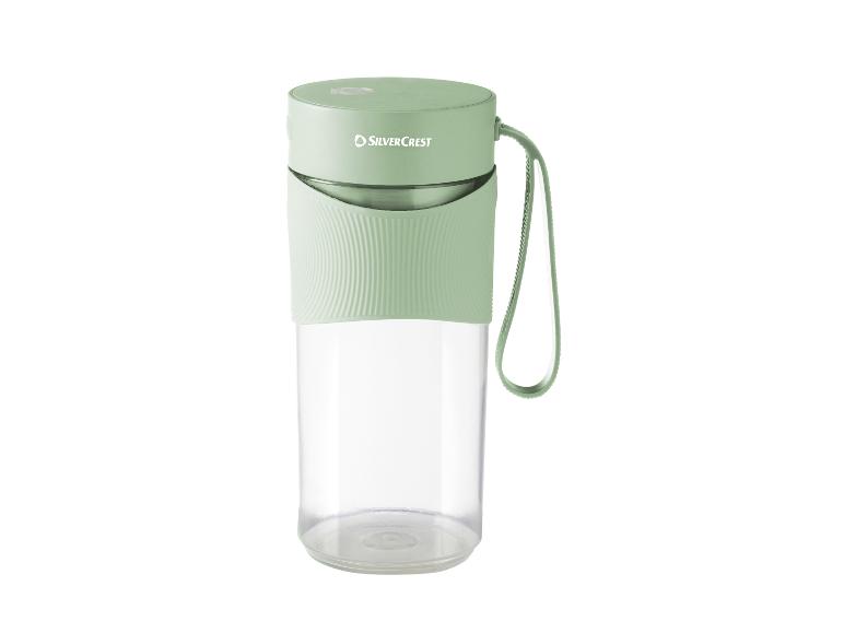 Mixeur portable vert SilverCrest avec récipient transparent et poignée.
