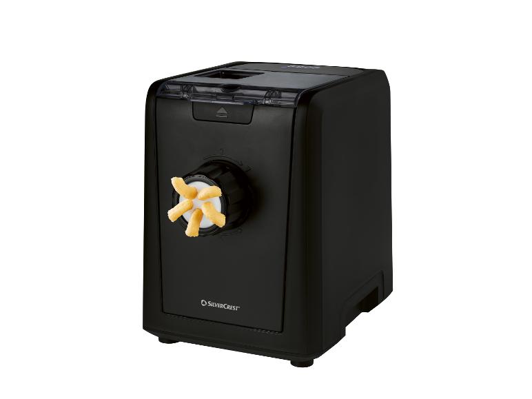Machine à pâtes noire avec des pâtes fraîches extrudées par l'avant