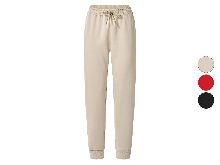 Pantalon de jogging beige avec cordon de serrage, disponible en rouge et noir