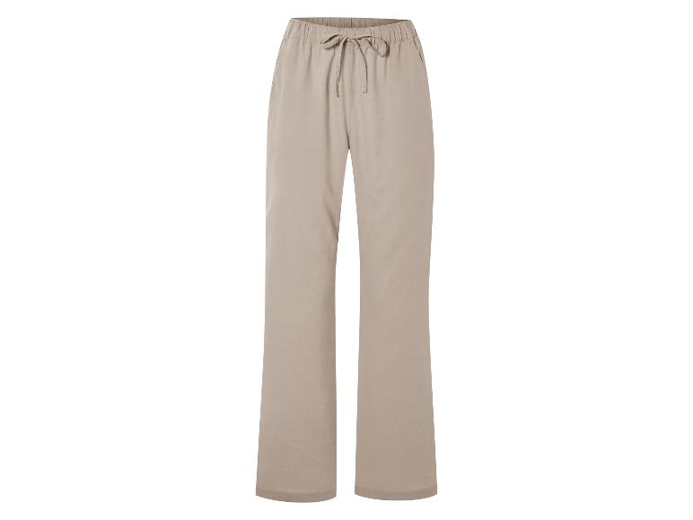 Pantalon beige ample à cordon de serrage.