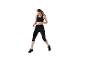 Vrouw in zwarte sportbeha en legging, rennend