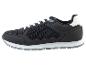 Zwarte sneaker met witte zool