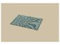 Tapis de bain texturé bleu-vert sur fond beige.
