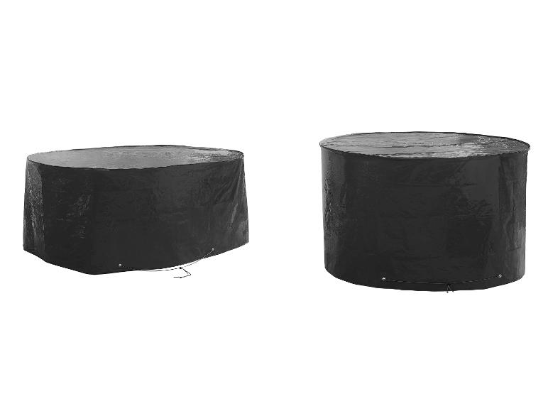 Deux housses de protection noires pour meubles de jardin ronds.