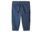 Pantalon en mousseline bleu foncé avec taille élastique et cordon de serrage.
