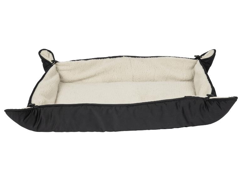 Lit noir pour animaux de compagnie avec intérieur crème et moelleux