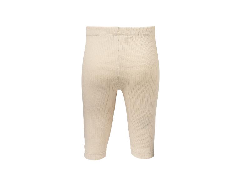 Lichtbeige geribbelde baby legging, achteraanzicht.