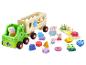 Peppa Pig houten speelgoedset met vrachtwagen, aanhanger en sorteervormen.