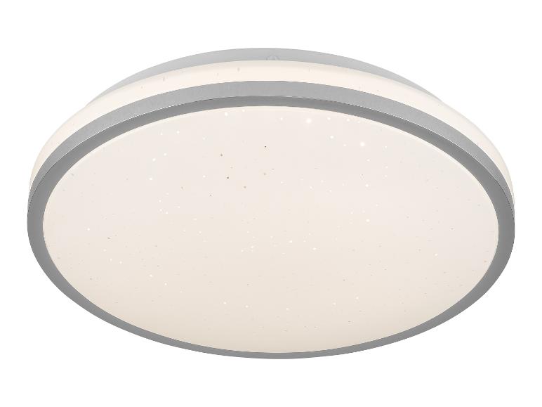 Een ronde plafondlamp met een zilveren rand en een sterrenhemel-effect.