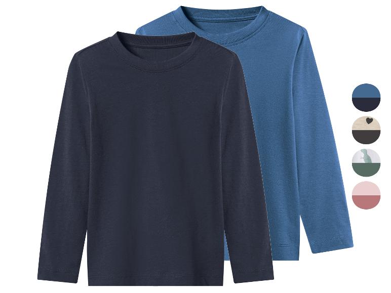 Deux t-shirts à manches longues pour enfants, un bleu foncé et un bleu clair, avec des échantillons de couleur.