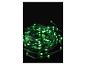 Guirlande lumineuse verte enroulée sur un fond noir