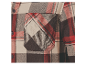 Détail d'une poche de chemise à carreaux.