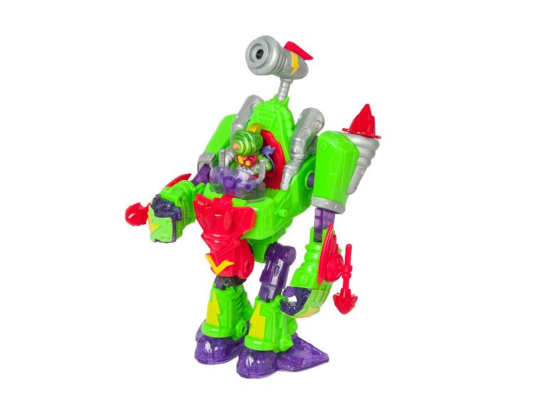 Jouet robot vert et rouge avec une petite figurine à l'intérieur, sur fond blanc.