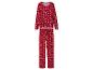 Rode pyjama met witte sneeuwvlokken en strikjesprint