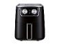 Zwarte Silvercrest airfryer met handmatige temperatuur- en tijdregelaars.