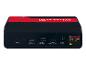 Un appareil portable Ultimate Speed noir et rouge avec divers ports USB et spécifications de sortie.
