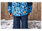 Une veste d'hiver bleue à motif géométrique et un pantalon assorti.