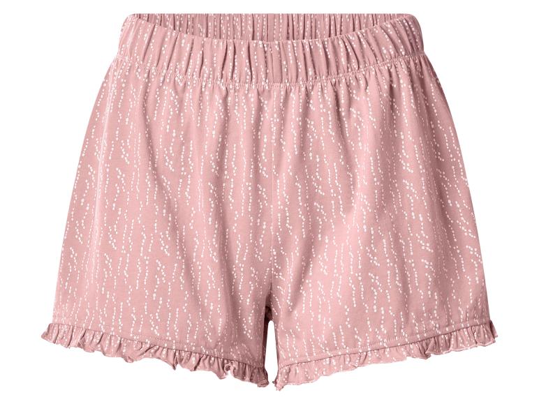 Shorts de pyjama roses à pois blancs et ourlet volanté.