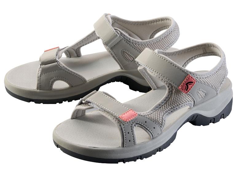 Sandales de sport grises avec des accents roses, fermetures auto-agrippantes et semelle robuste.